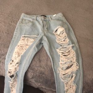 Super distressed bum jeans